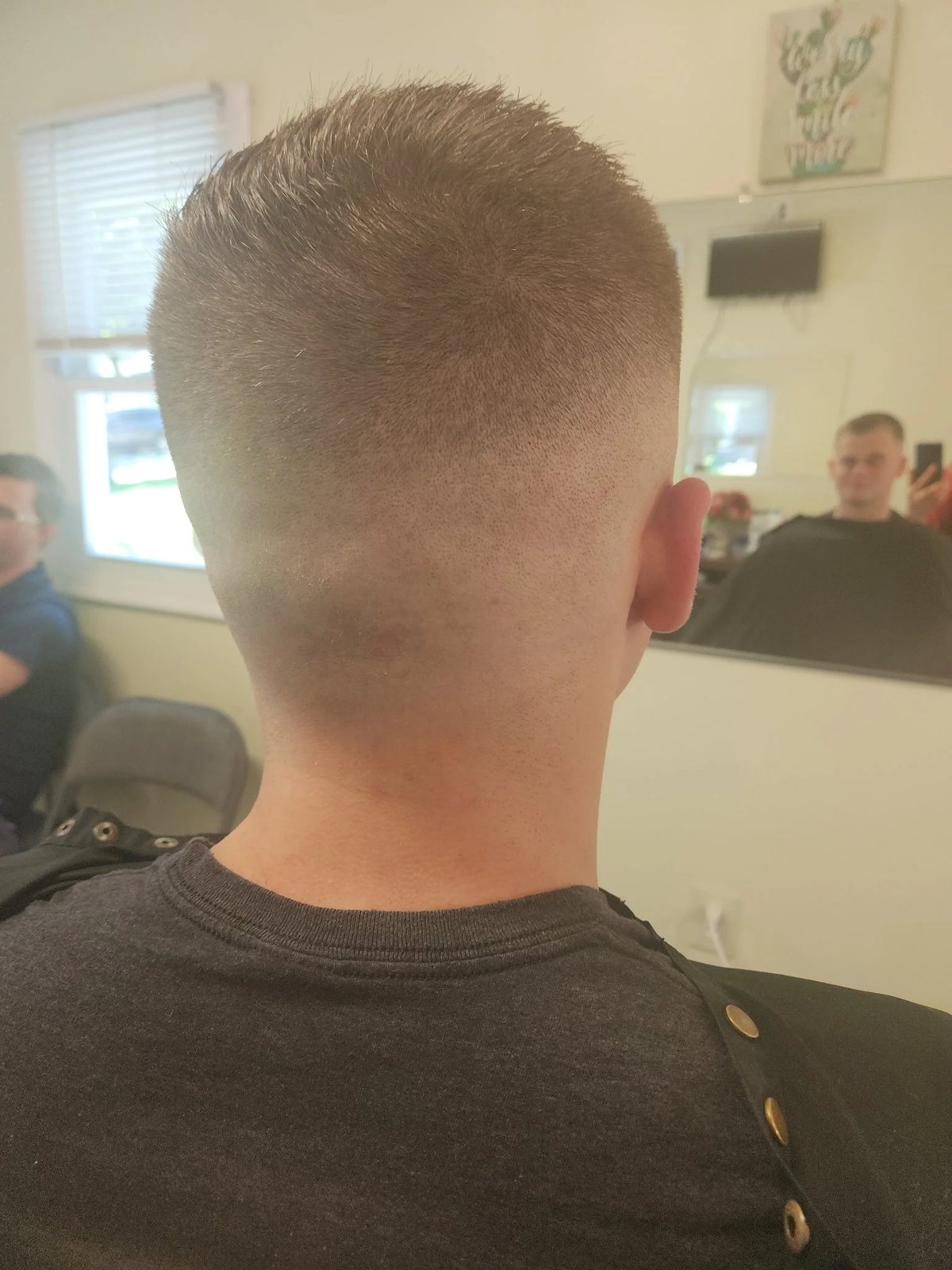 Kid's tapered haircut back view at Happy Barber