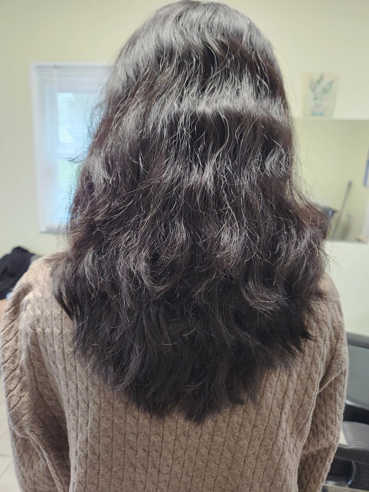 Medium dark haircut with red tones at Happy Barber