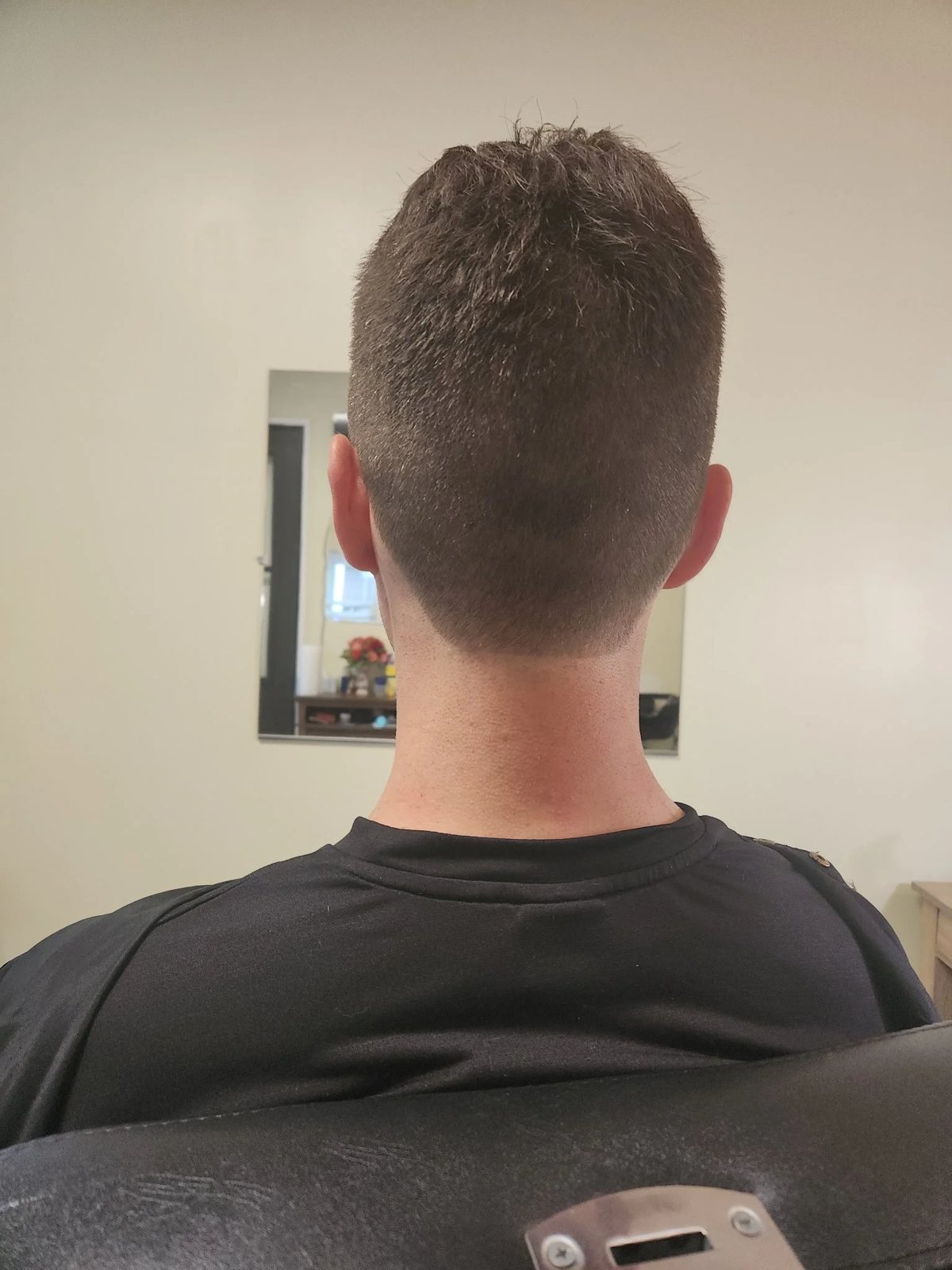 Skin fade haircut side view at Happy Barber