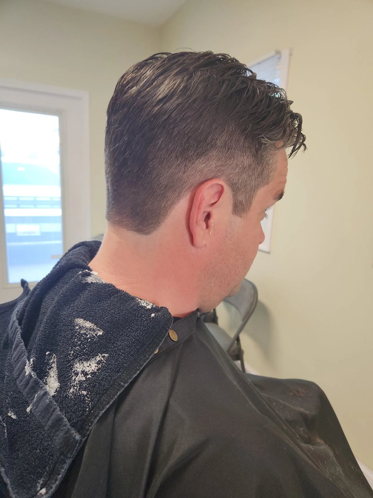Women's soft wavy haircut at Happy Barber